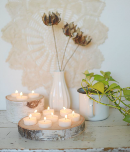 ideas para decorar con rodajas de madera soporte para velas